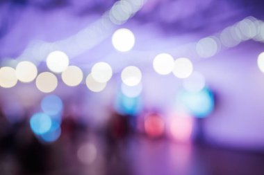 Light bulb decor in indoor party. blurred photo