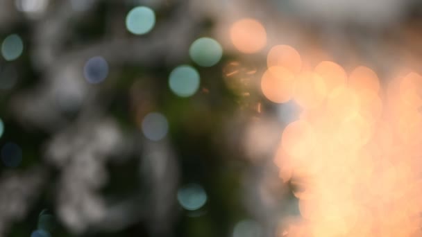 Christmas tree decorated with sparkly christmas tree toys and shining lights. Defocused object — 비디오