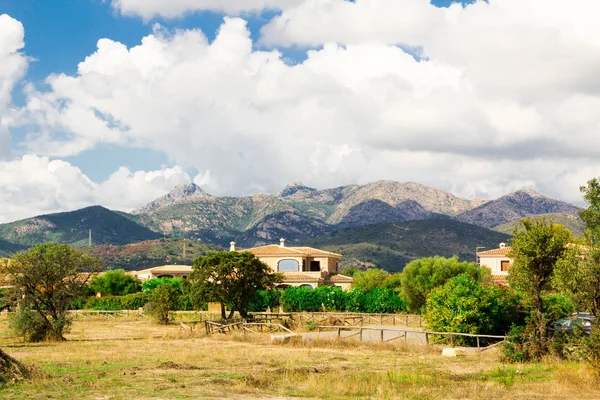 SAN TEODORO, Traditional holiday villa houses on beach, Sardinia island, Italy