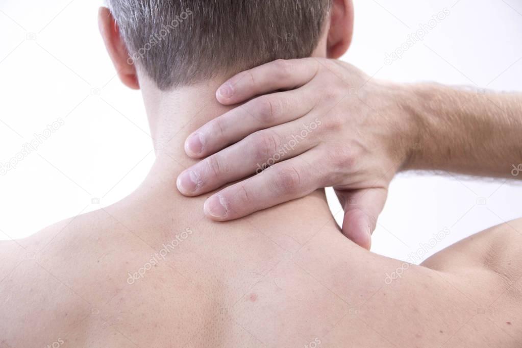 Pain in the neck. Man with backache. Muscular male body. Isolated on white background with red dot. healthcare and problem concept unhappy man suffering from neck or shoulder pain at home