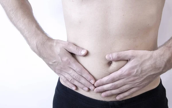 Blinddarmentzündung. Schmerzen in der rechten Seite. . im Bauch, Nahaufnahme. — Stockfoto