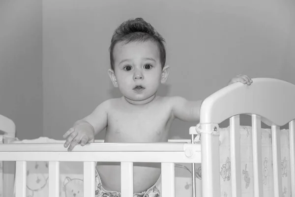 Crying baby do not want to sleep black and white photography — Stock Photo, Image