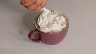 Close up Whip cream on Cocoa white background, Food concept Front view.