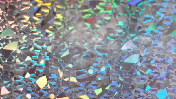 Color neon gradient. Moving abstract blurred background. silver paper with a holographic effect. close up Shot Slow Motion video — Stock Video
