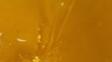 Oil drops and ripple. Drops of oil falling in pond and making ripple. Slow motion. Shot video.