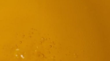 Oil drops and ripple. Drops of oil falling in pond and making ripple. Slow motion. Shot video.