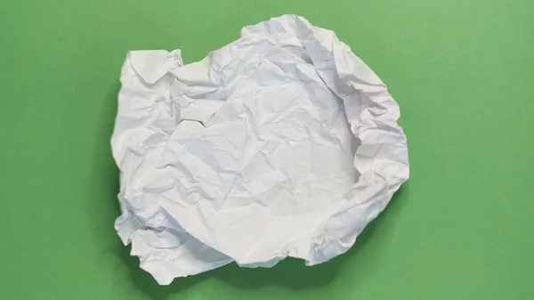 Big square crumpled paper on a green background — Stock Photo, Image