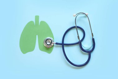 Lung health therapy medical concept . silhouette of the lungs and a stethoscope on a green background. concept of respiratory disease, pneumonia, tuberculosis, bronchitis, asthma, lung abscess clipart