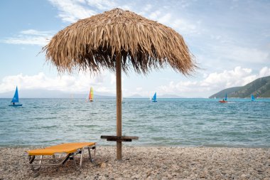 Thatch şemsiye Yunanistan sahilde