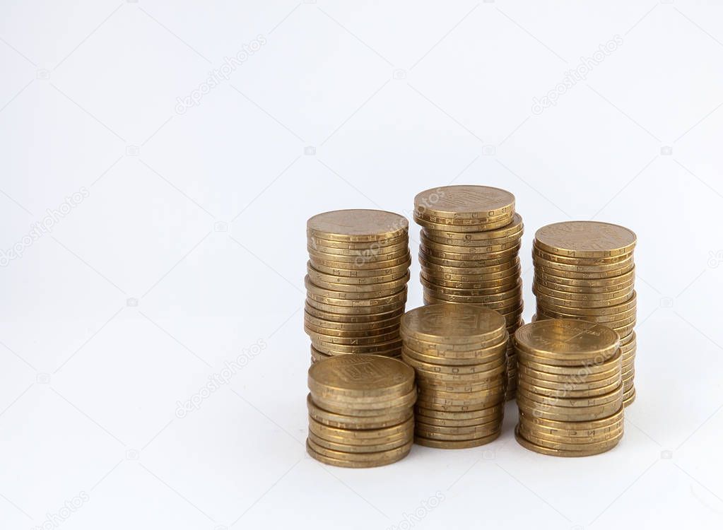Growing coins stacks on white background. Financial growth, saving money, business finance wealth and success concept