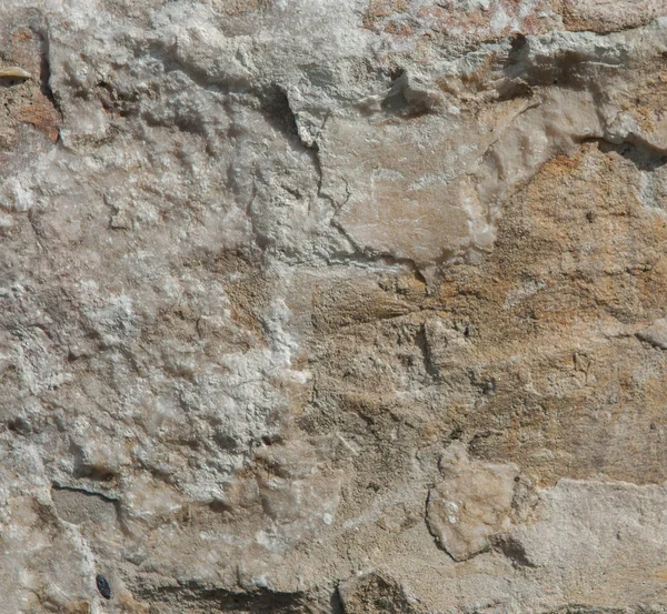 Estrutura da superfície da pedra, usada como fundo. Textura de pedra. Rochas naturais — Fotografia de Stock
