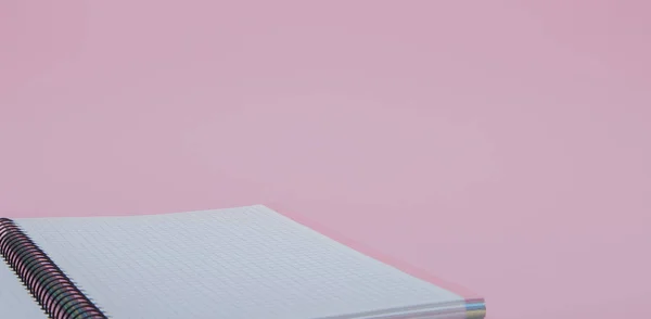 Notebook na růžovém pozadí — Stock fotografie
