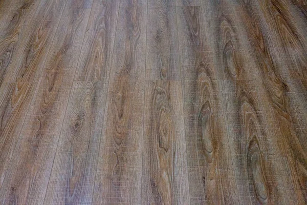 The floor of the light brown laminate diagonally — Stock Photo, Image