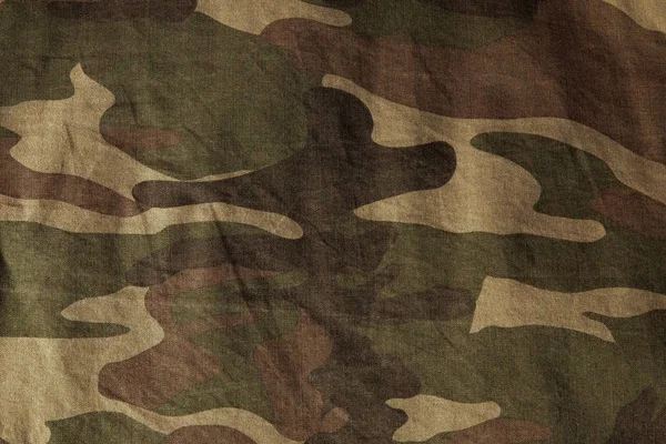 Primo piano della superficie uniforme militare. Texture di tessuto, primo piano, colorazione militare — Foto Stock