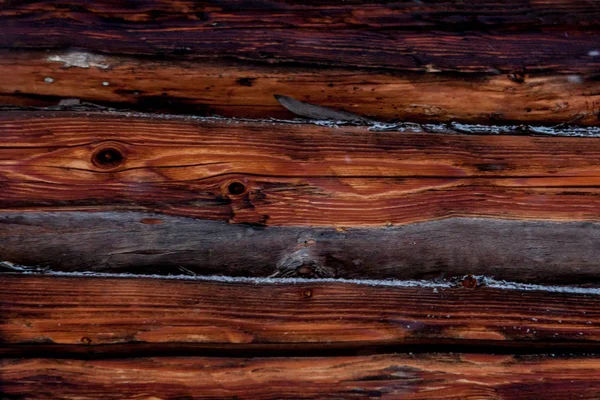 Närbild bakgrund av gamla trä plankor under snö — Stockfoto