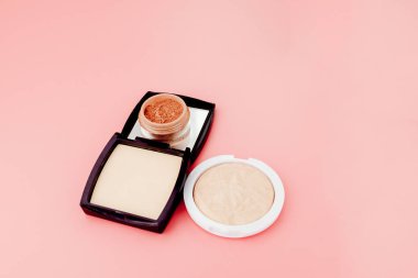 Tonal foundation and highlighter, base for make-up in the form of a cushion. Highlighter powder cosmetic product top view