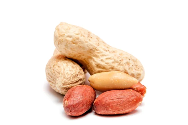 Grande amendoim descascado close-up de feijão na casca. Amendoins descascados na casca. Amendoins, para fundo ou textura. Crescimento de proteínas orgânicas — Fotografia de Stock