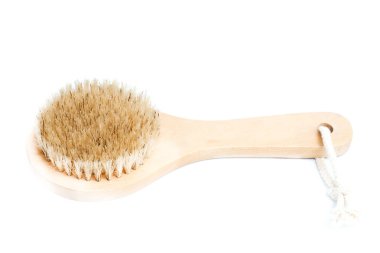 Closeup of cactus fiber body brush isolated on a white background. Natural, plastic free beauty tool. Bath and home self care concept. Flat lay, top view. Copy space for your text.
