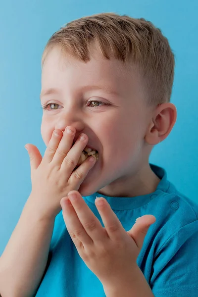 Little Boy Holding Eating Banana Blue Fone Food Diet Health — стоковое фото