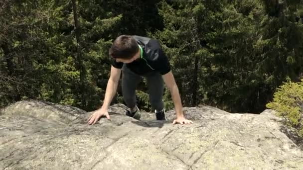 Tourist Man Climbs Rock Reached Top Cliff — Stock Video