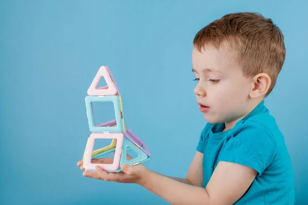 Boy Looks Shape Color Constructor Connection Magnets — Stock Photo, Image