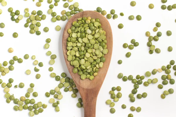 Dried Green Peas into a spoon — Stock Photo, Image