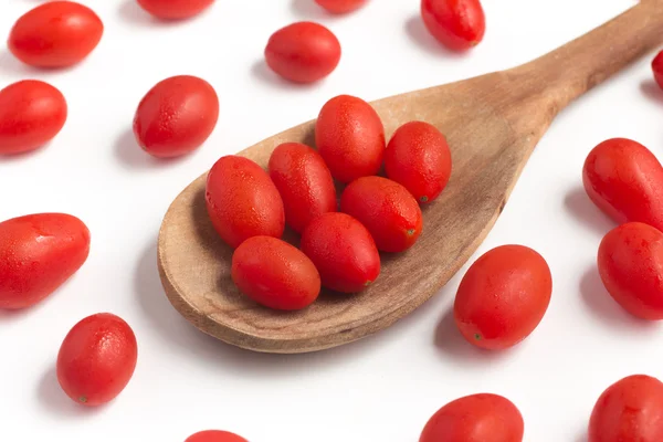 Cherry Tomatoes into a spoon — Stock Photo, Image