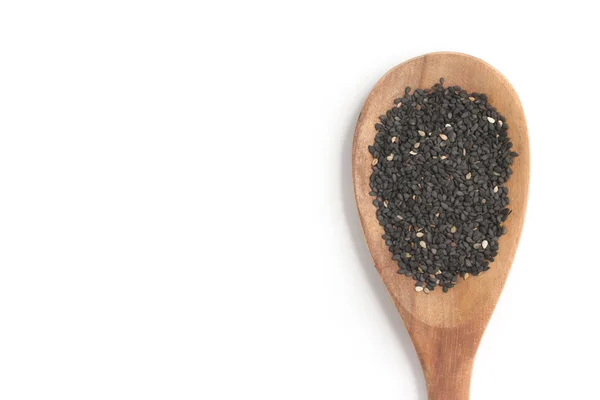 Schwarzer Sesam in einen Löffel — Stockfoto