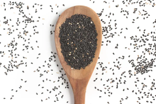 Schwarzer Sesam in einen Löffel — Stockfoto