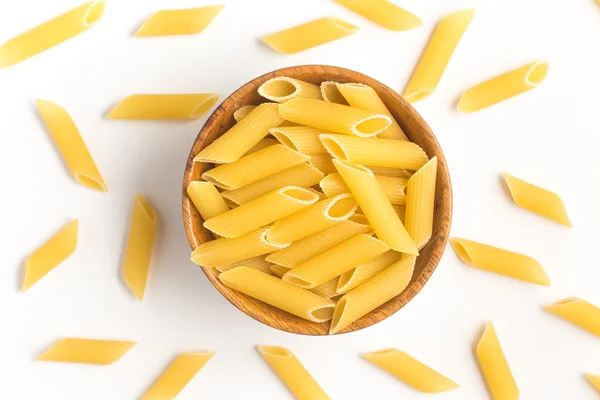 Penne into a bowl — Stock Photo, Image