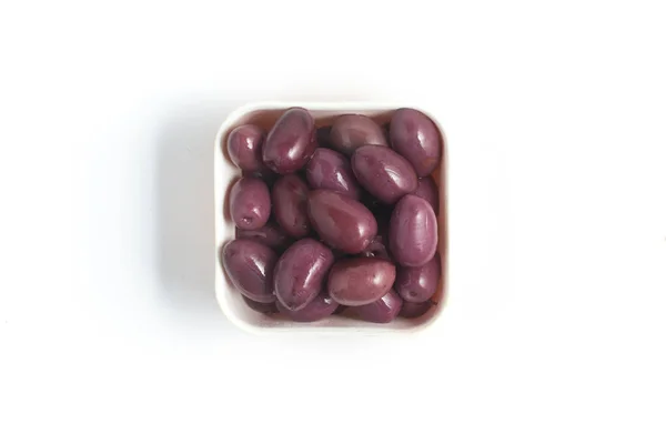 Svarte oliven i en skål – stockfoto