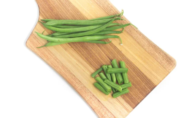 Green Beans Pods sobre uma tábua de madeira. Magro — Fotografia de Stock