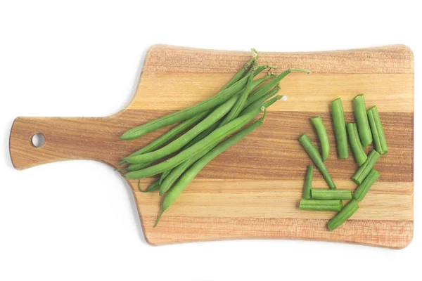 Green Beans Pods sobre uma tábua de madeira. Magro — Fotografia de Stock