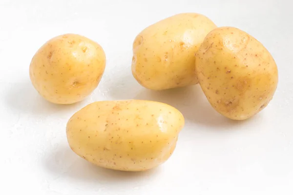 Four Wet Potatoes — Stock Photo, Image