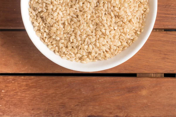 Cateto pełnoziarnisty ryż w misce — Zdjęcie stockowe
