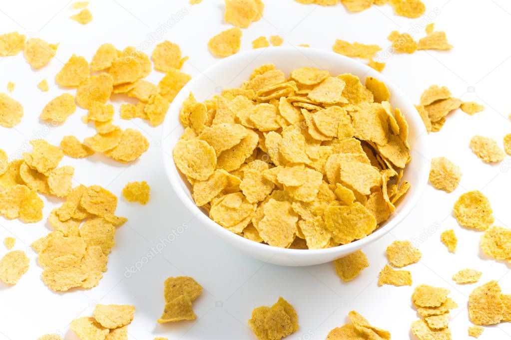 Corn Flakes into a bowl