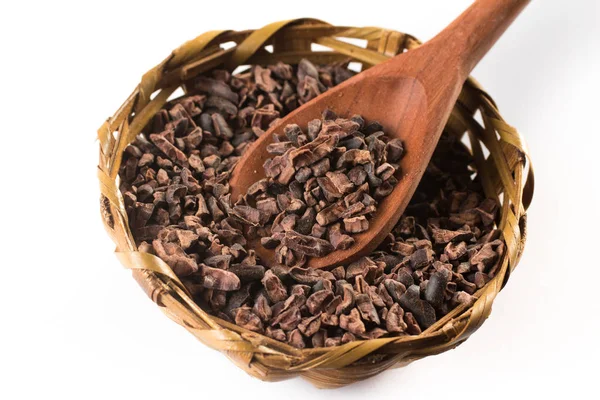Plumas de cacao en una cuchara — Foto de Stock