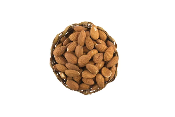 Almonds in a basket bowl — Stock Photo, Image