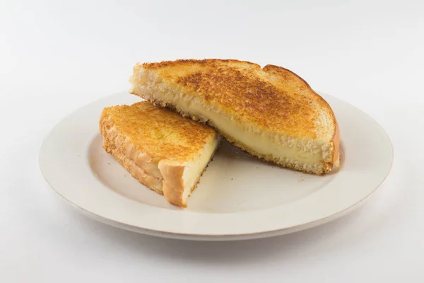 Hot cheese with toasted bread. — Stock Photo, Image