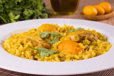 Galinhada: chicken with pequi