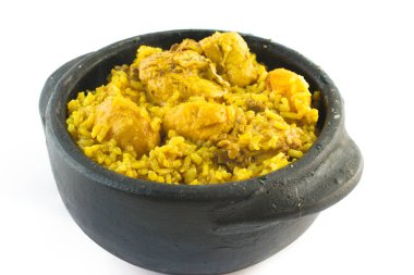 Galinhada: chicken with pequi