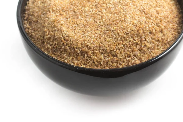 Mletí pšenice za kibbe v misce / Trigo para quibe. — Stock fotografie