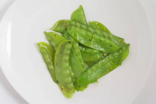 Cooked green peas pod — Stock Photo, Image
