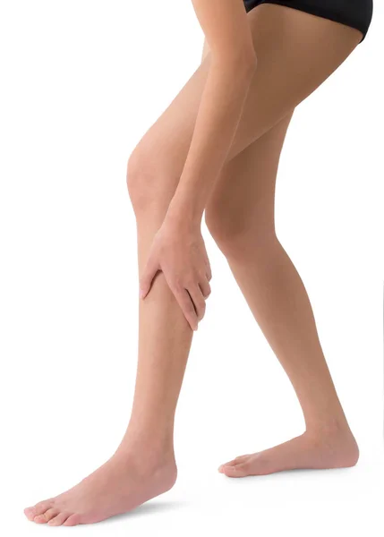 Woman holding her beautiful healthy long leg with massaging shin and calf in pain area, Isolated on white background. — Stock Photo, Image