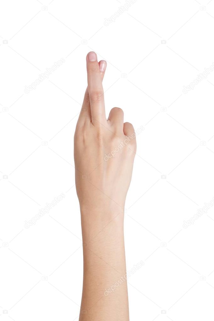 Woman's hand gesturing crossed fingers back side, Isolated on white background.