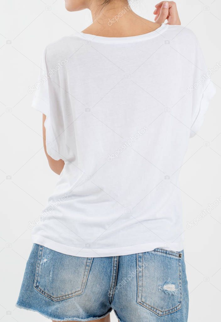 woman body in white T-shirt  with short rip jeans back side isolated, on white background.
