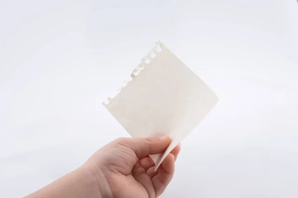 Hand holding a note paper — Stock Photo, Image