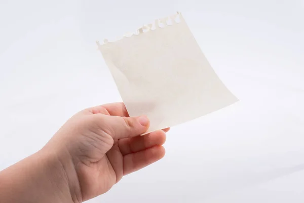 Hand holding a note paper — Stock Photo, Image