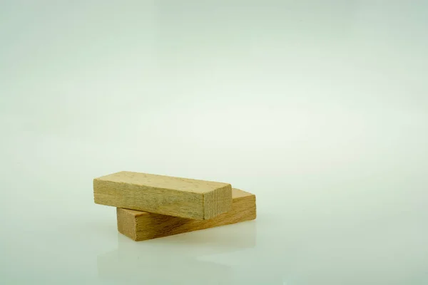 Domino de madera sobre fondo blanco — Foto de Stock