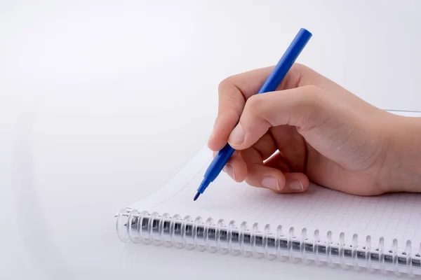 Hand writing on a Notebook — Stock Photo, Image